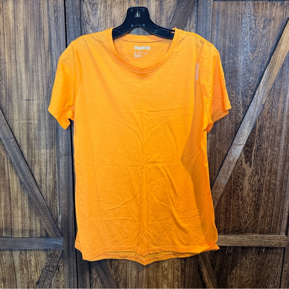 Reebok Woman’s Vibrant Orange Sport Tee